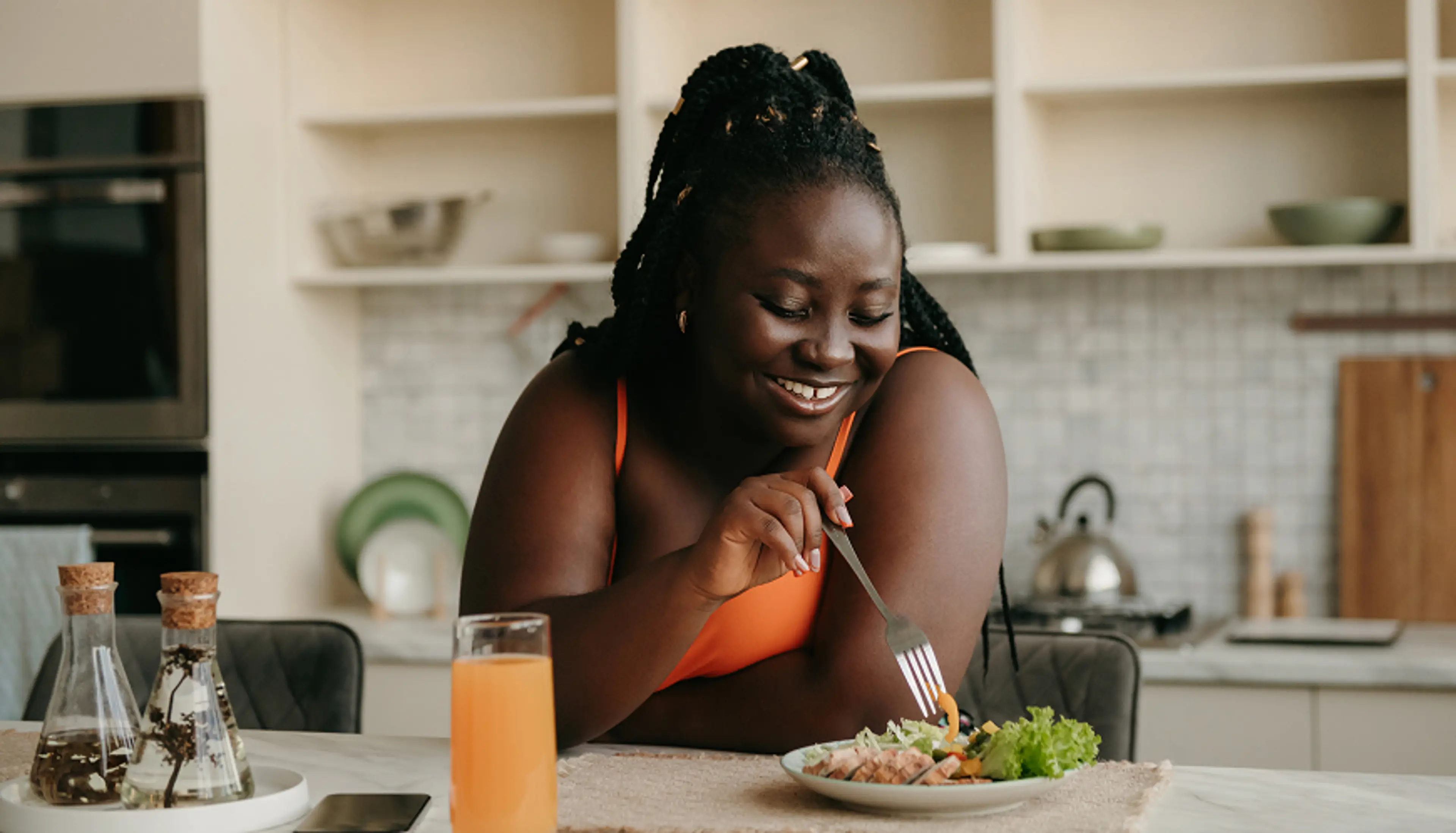 A person using a work eating food.